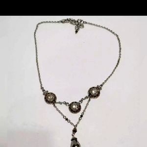 4 necklaces and 1 bracelet by Brighton